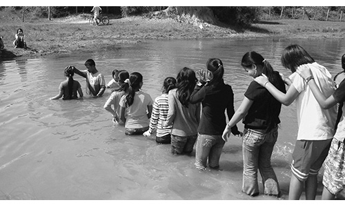 Great rejoicing as 57 get baptised in Cambodian lake