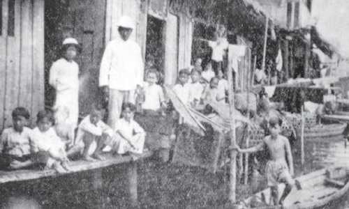A Chinese Peter making fishers of men in old Singapore sea village